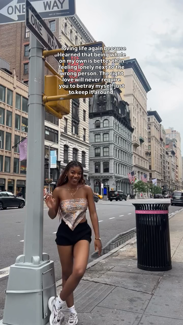 Verena smiling on a city street